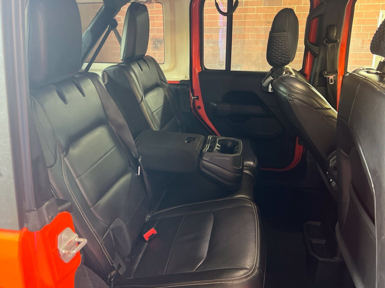 Used 2020 Orange Jeep Unlimited Sahara image 15