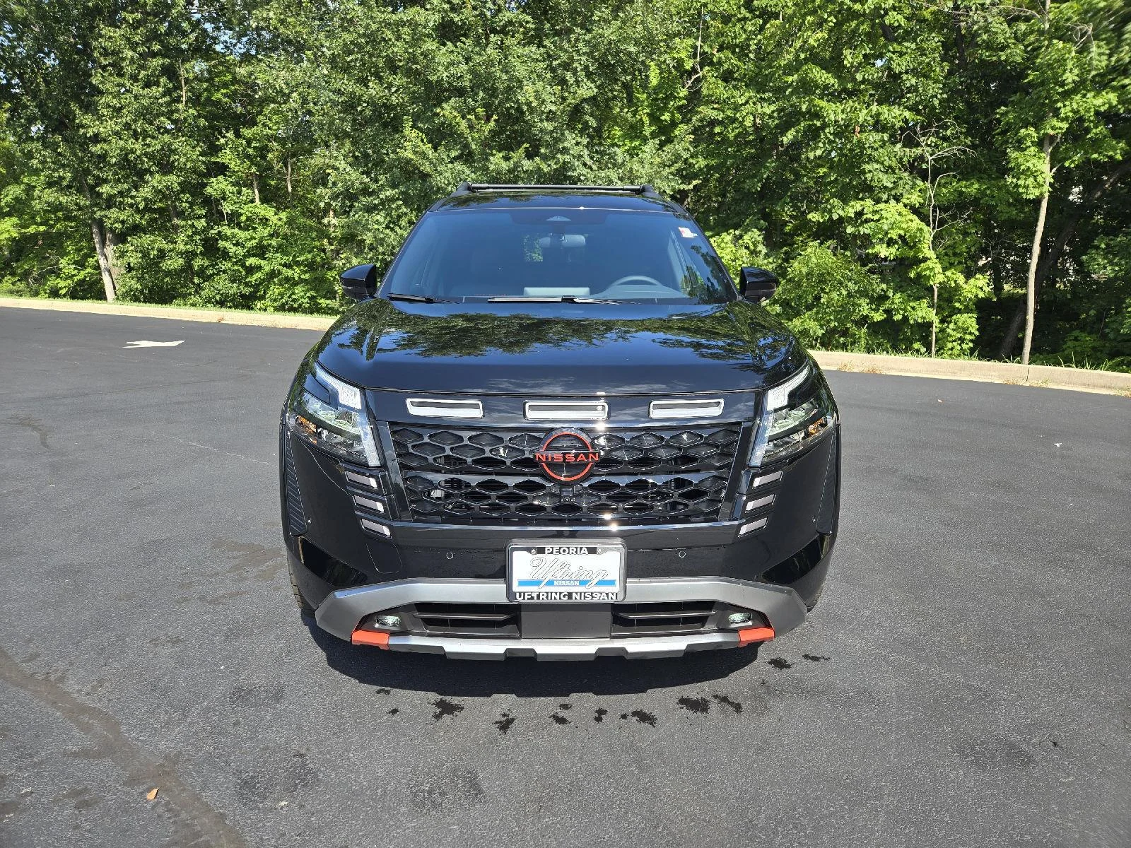 New 2026 Super Black Nissan Rock Creek image 7