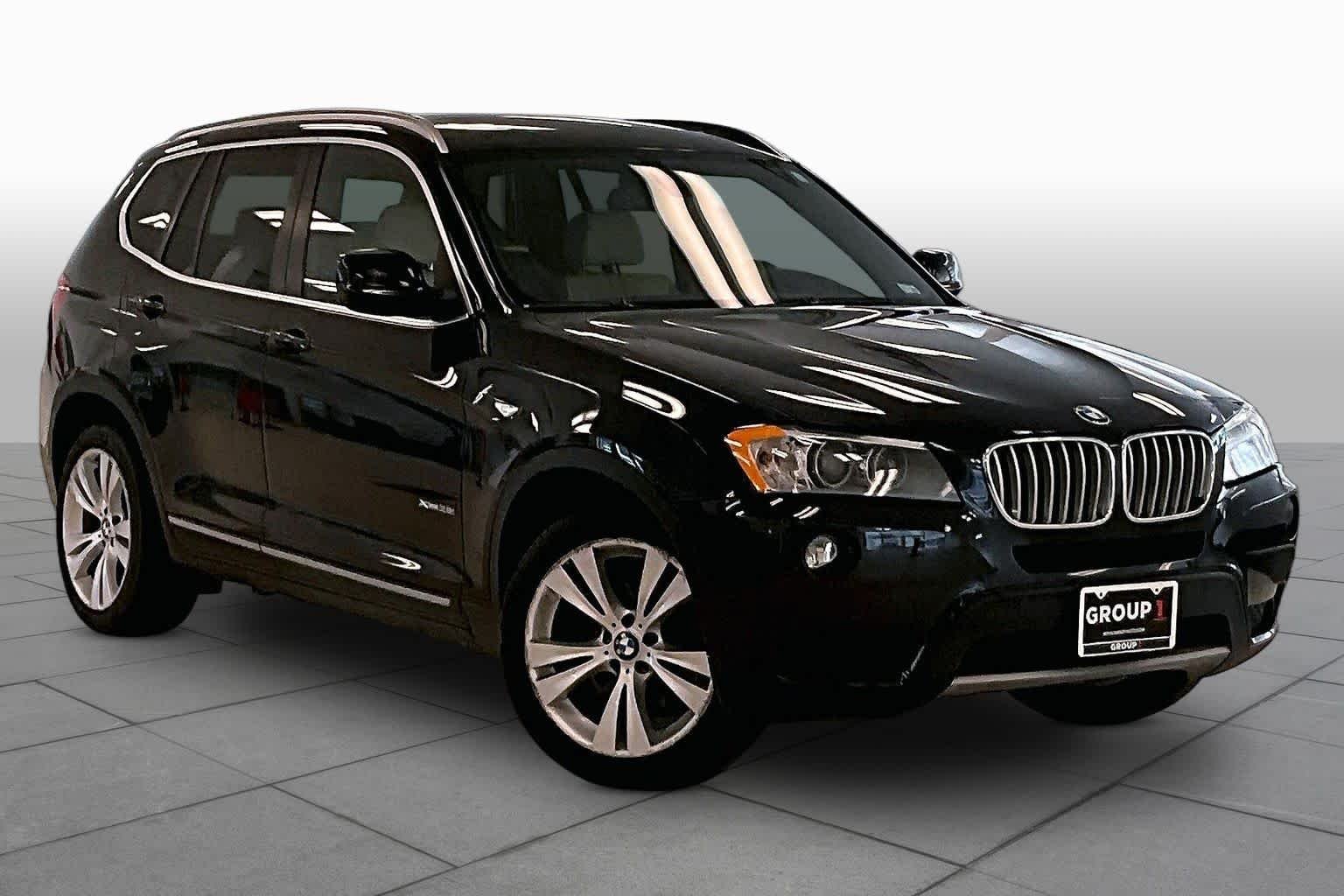 Used 2012 Black Sapphire Metallic BMW 35i image 2