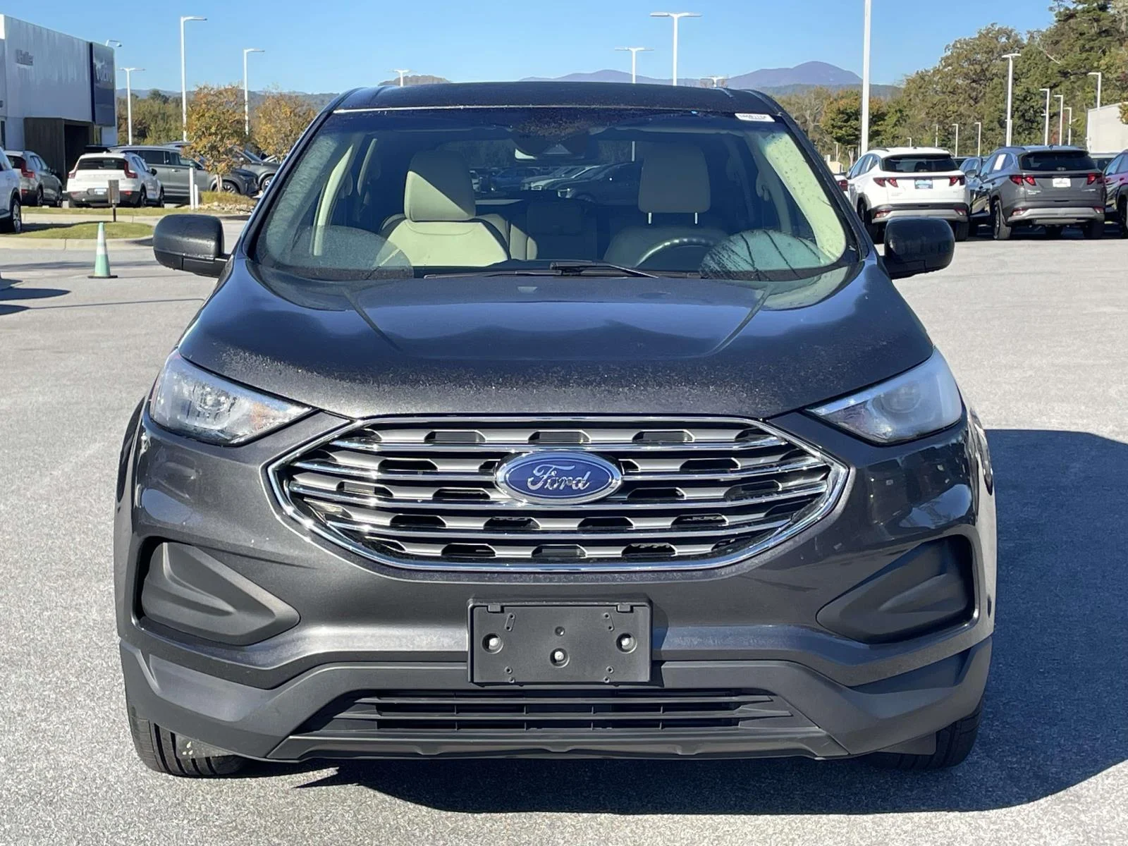 Used 2020 Magnetic Metallic Ford SE image 23