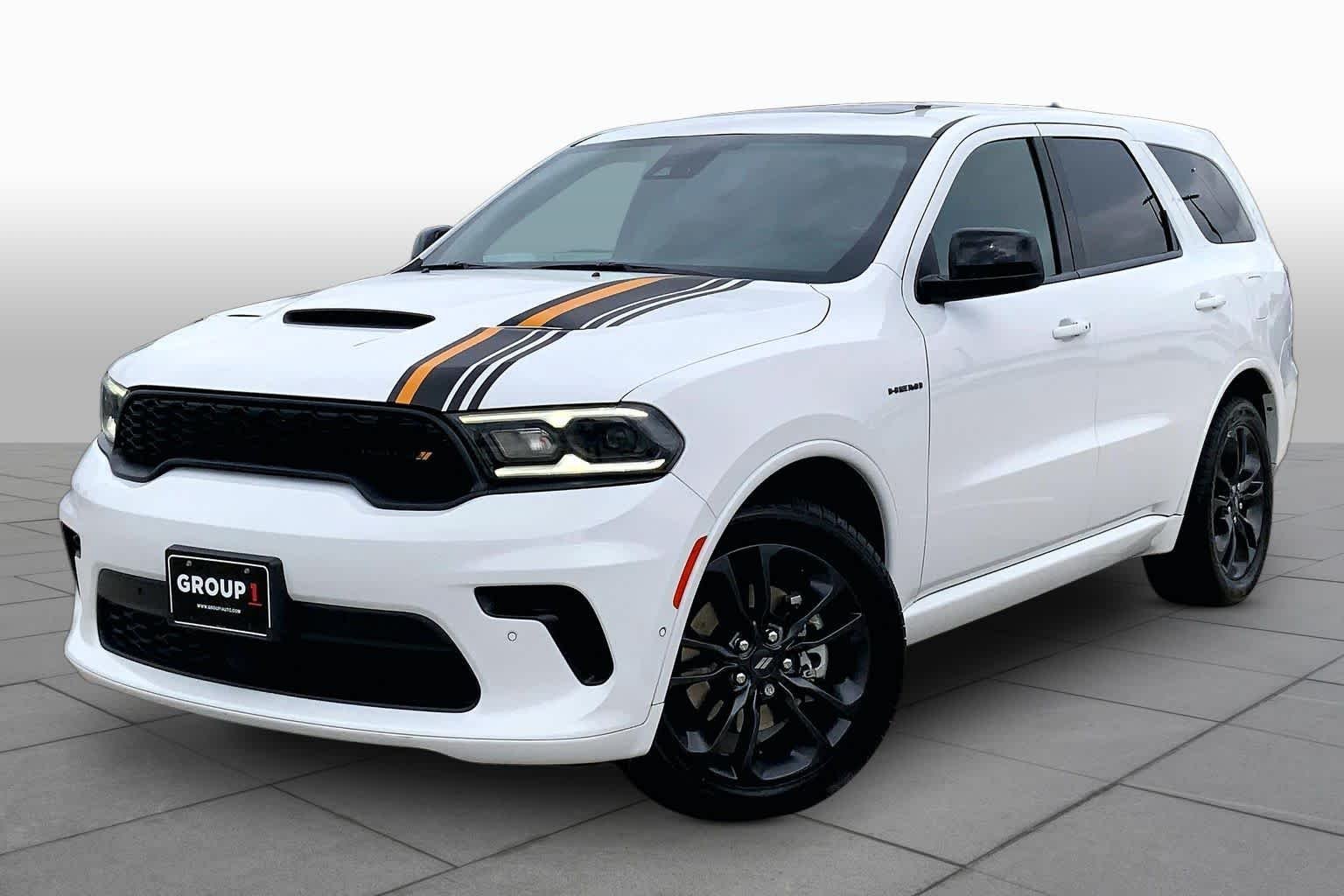 Used 2023 White Knuckle Clearcoat Dodge Hemi Orange image 2