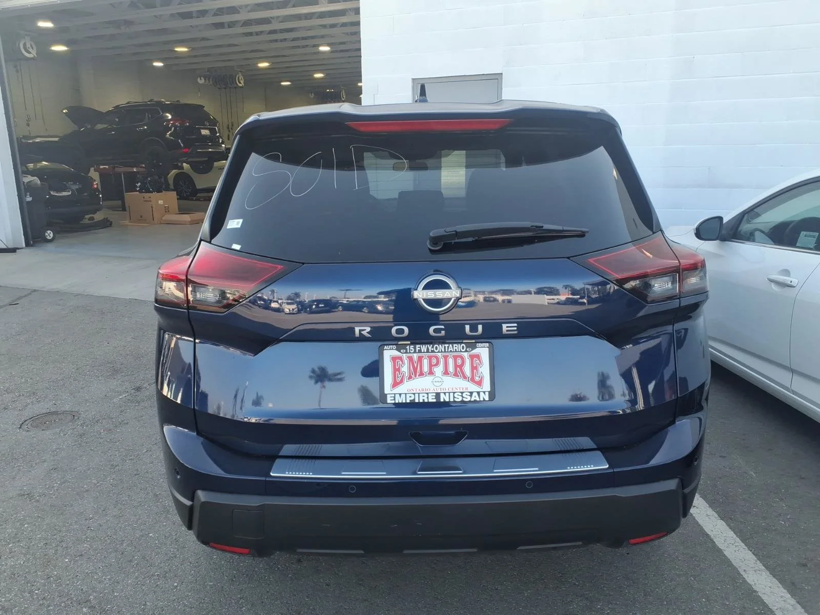 Certified Used 2025 Deep Ocean Blue Pearl Nissan SV image 6