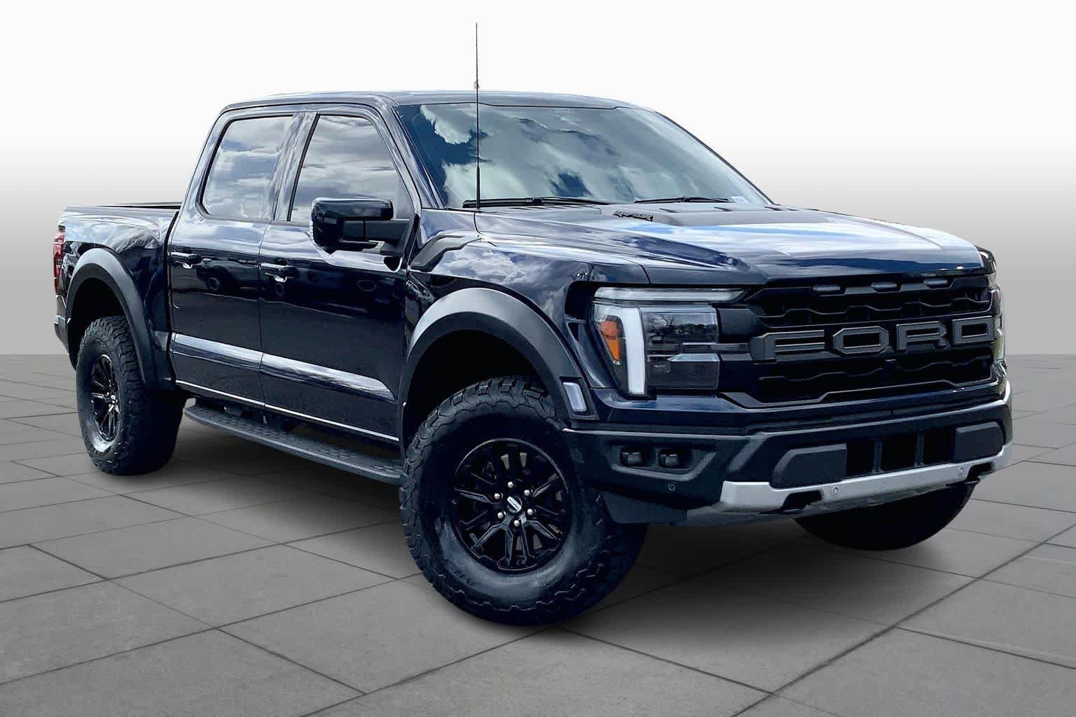 Used 2025 Antimatter Blue Metallic Ford Raptor image 4