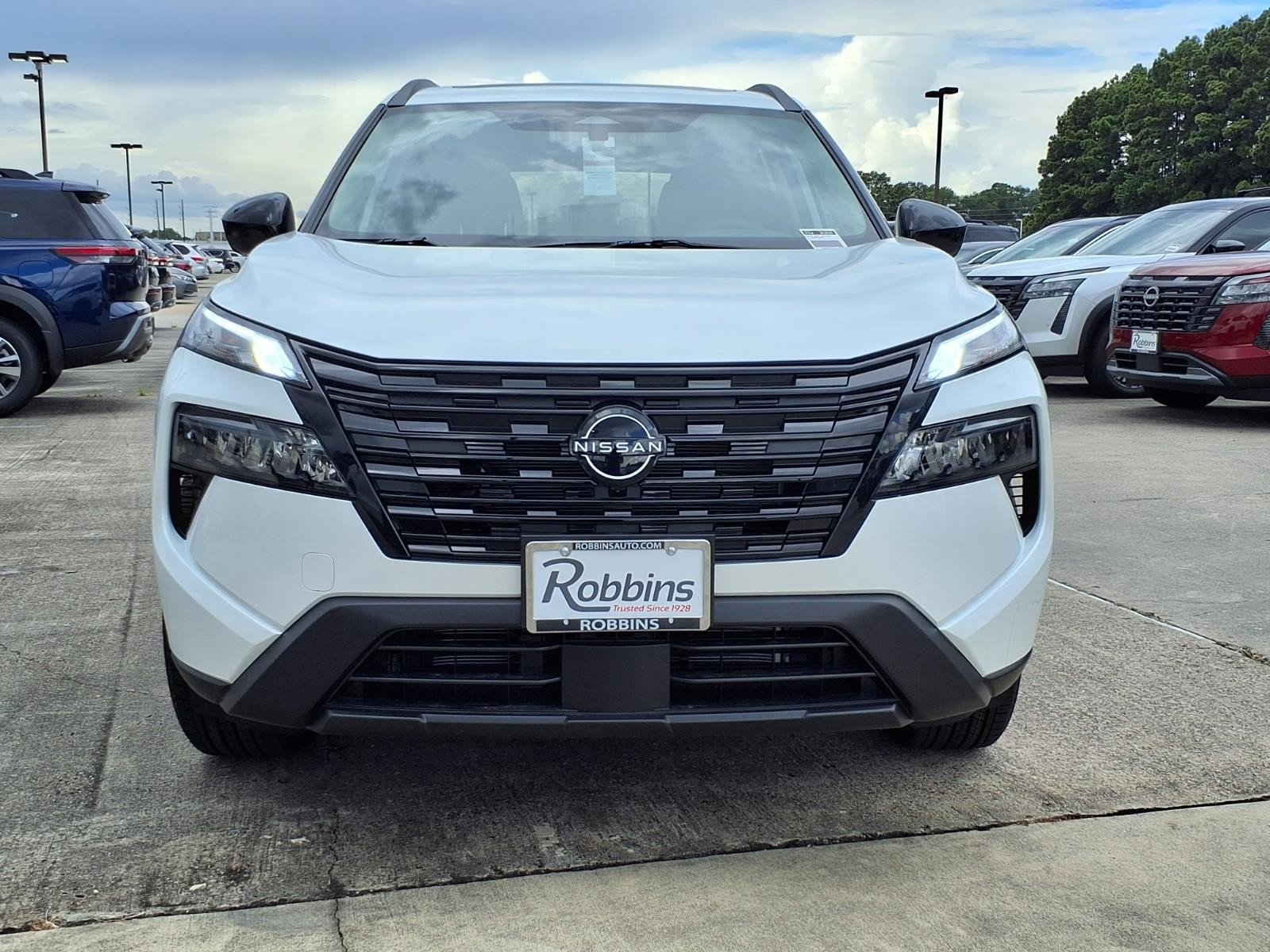 2026 Nissan Rogue Dark Armor™ White at Robbins Nissan