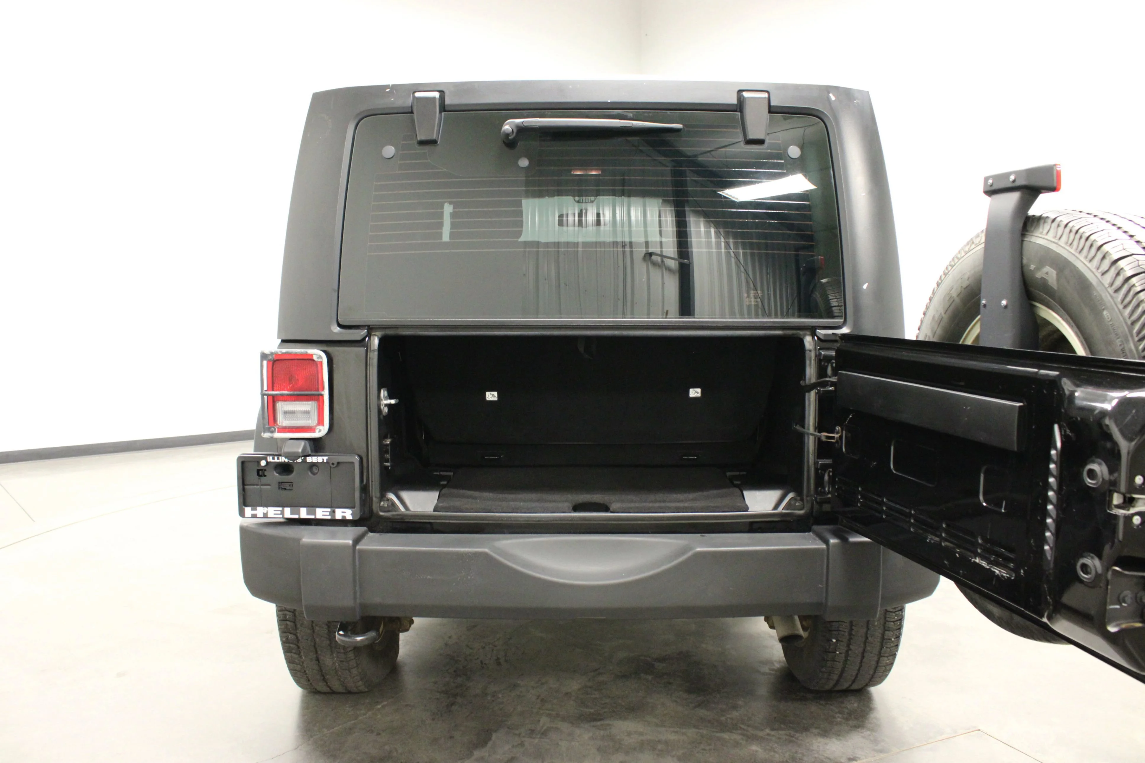 Used 2015 Black Clearcoat Jeep Sport image 14