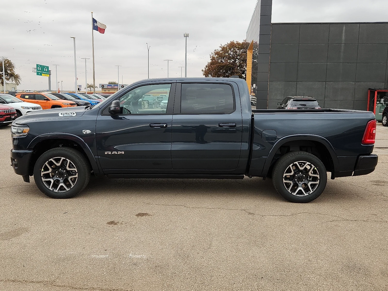 New 2026 Forged Blue Metallic  Paint Ram LARAMIE CREW CAB 4X4 5
