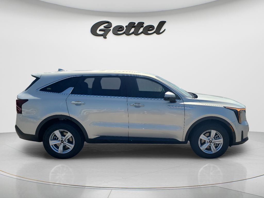 New 2026 Ivory Silver Kia LX image 4