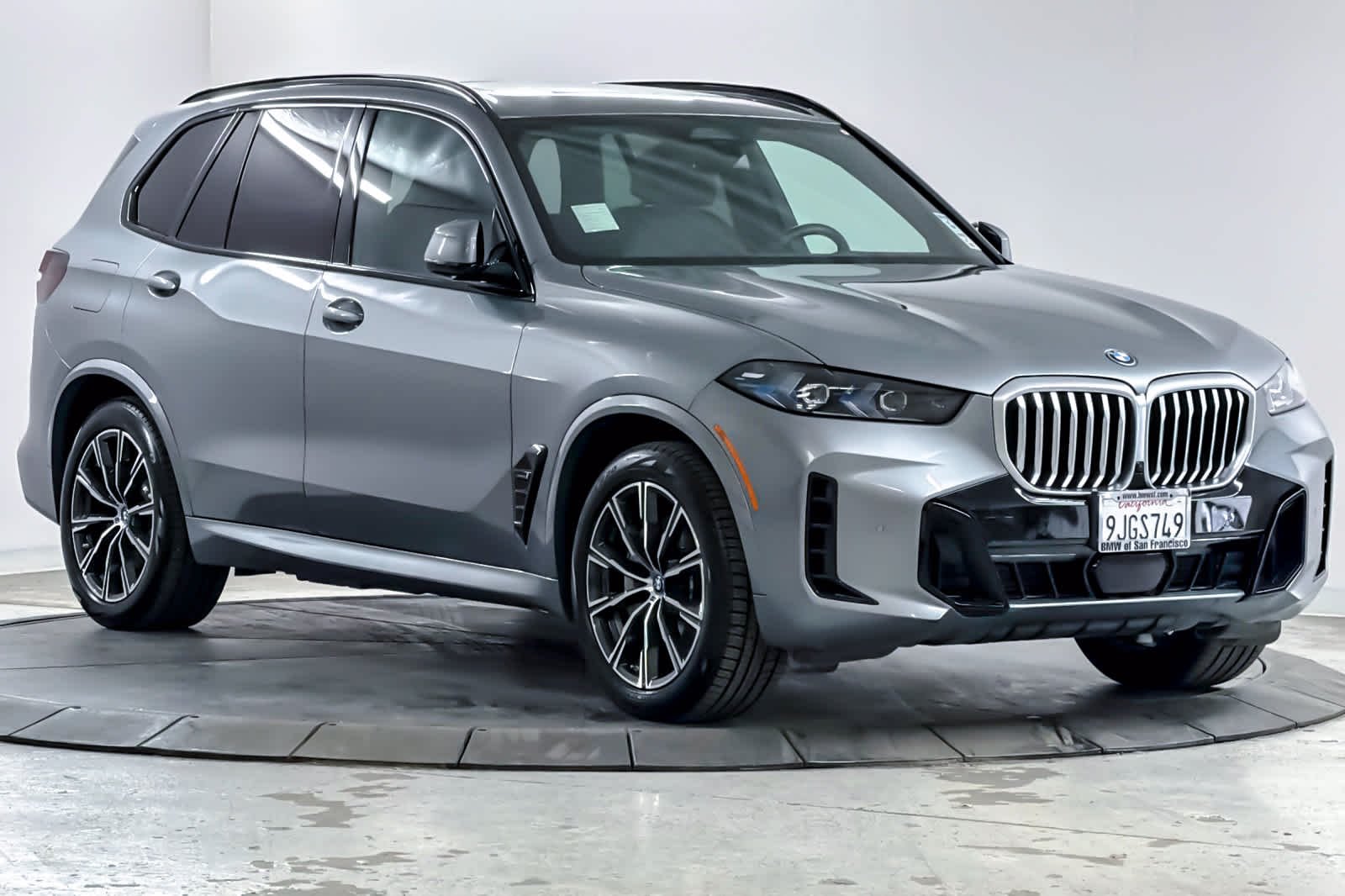 Used 2024 Skyscraper Grey Metallic BMW xDrive50e image 9