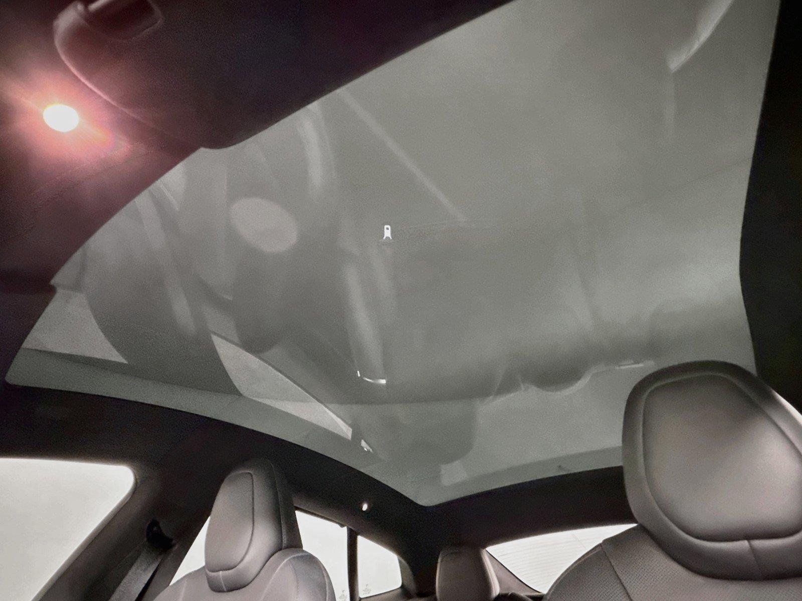 Used 2021 Solid Black Tesla Plaid image 6