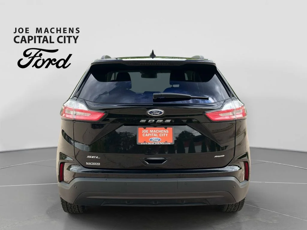 Used 2024 Agate Black Metallic Ford SEL image 6