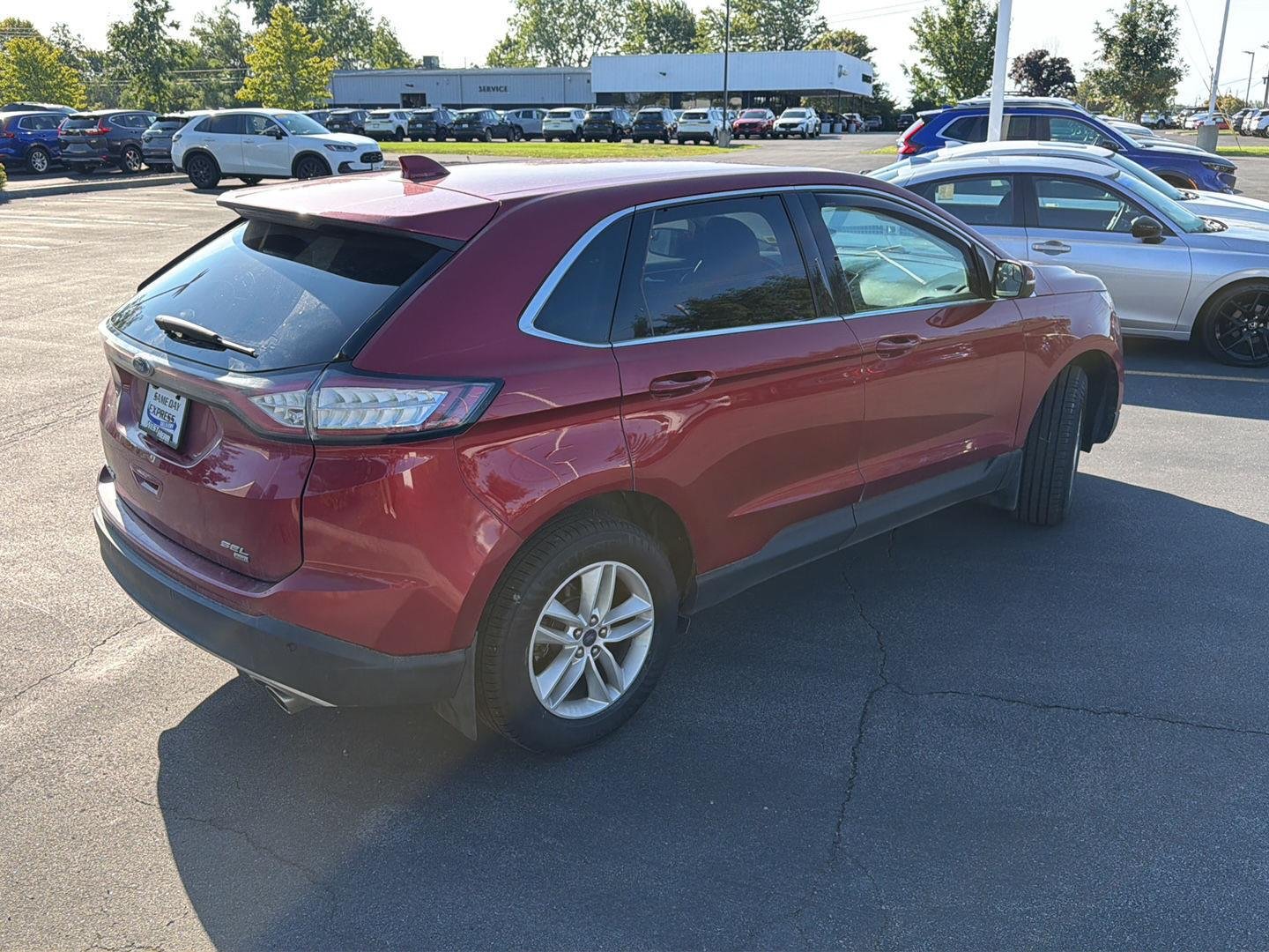 Used 2018 Ruby Red Metallic Tinted Clearcoat Ford SEL image 7