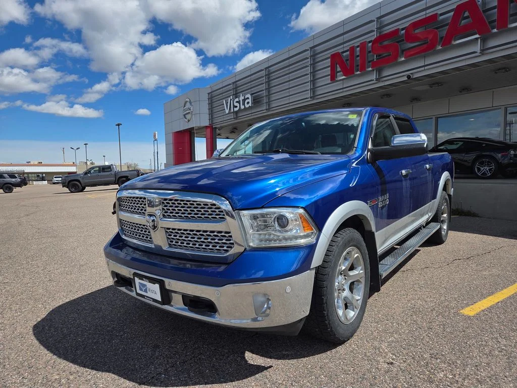 Used 2015 RAM Ram 1500 Pickup Laramie with VIN 1C6RR7NM6FS751559 for sale in Delta, CO