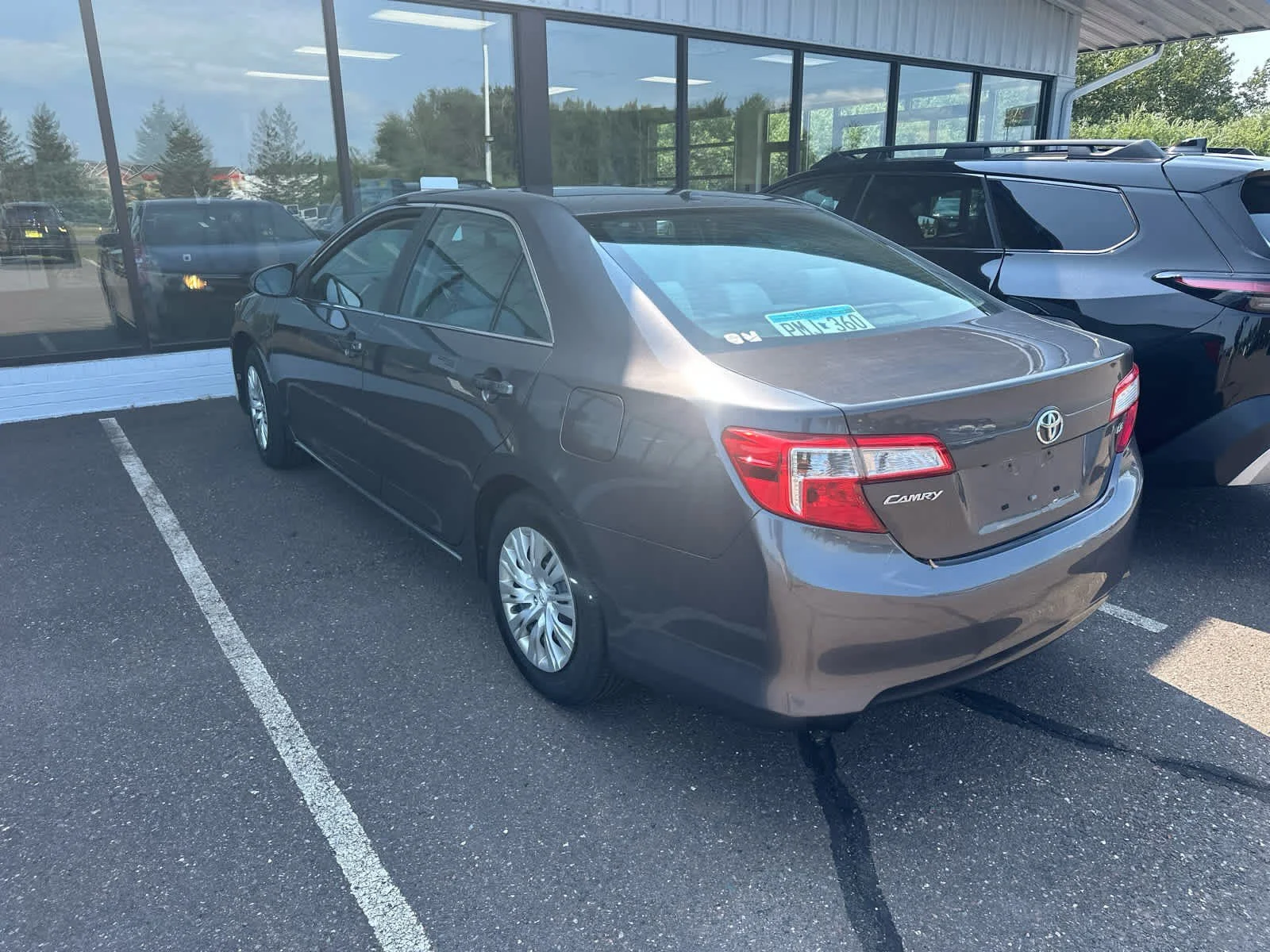 Used 2014 Magnetic Gray Metallic Toyota LE image 4