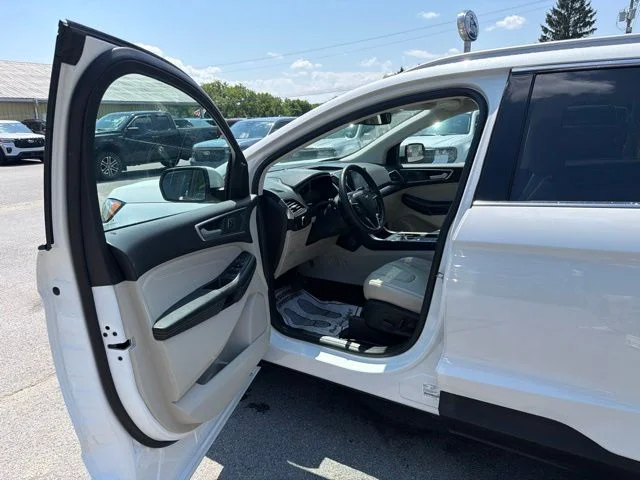 Used 2023 White Metallic Ford Titanium image 18
