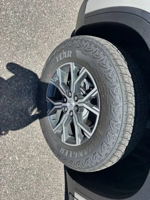 New 2026 Riverstone Metallic GMC AT4 image 11