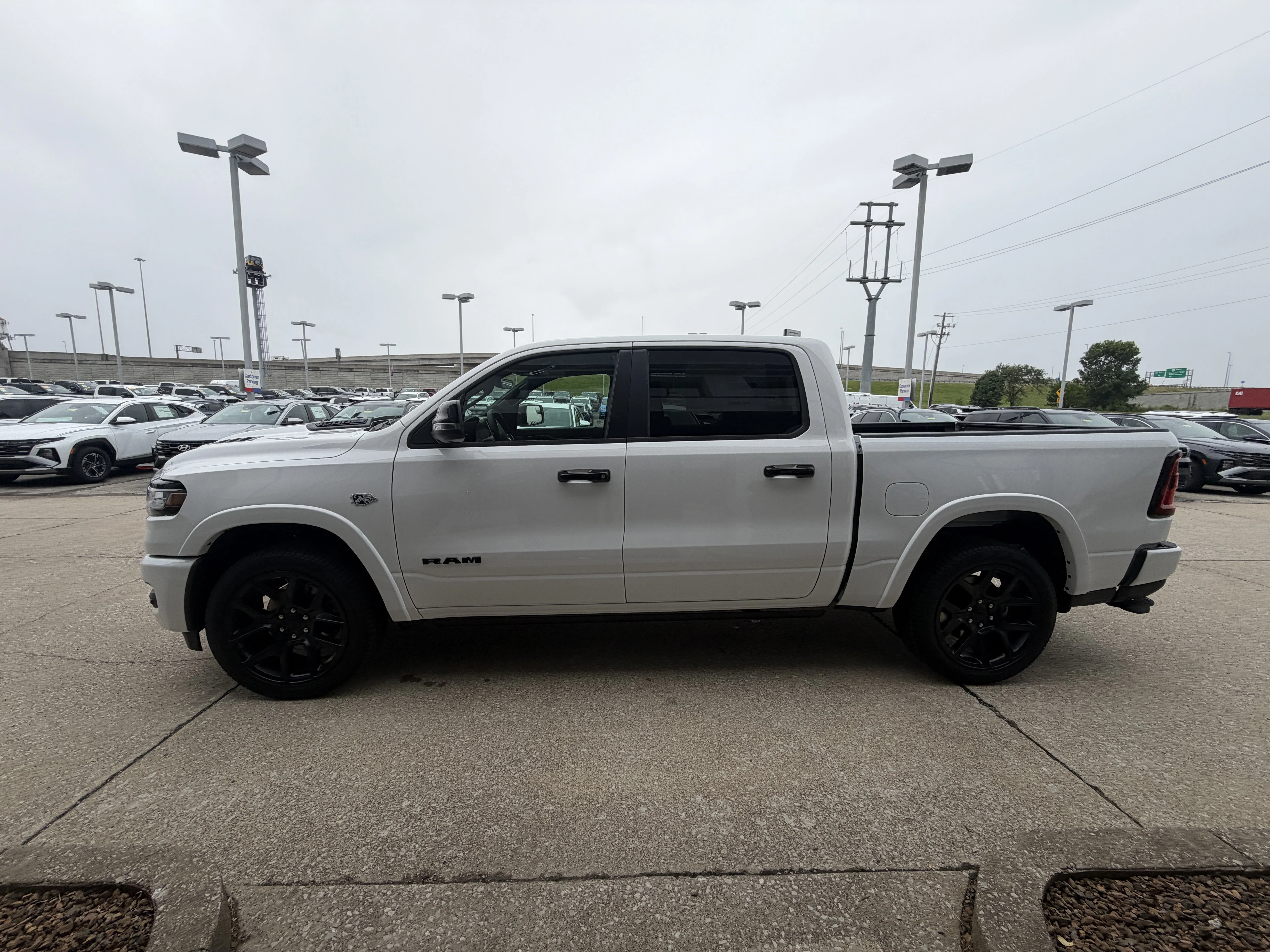 New 2026 Bright White Clear-Coat Exterior Paint RAM Laramie image 16