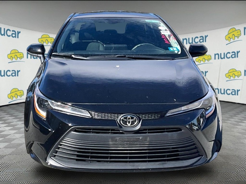 Used 2025 Black Toyota LE image 2