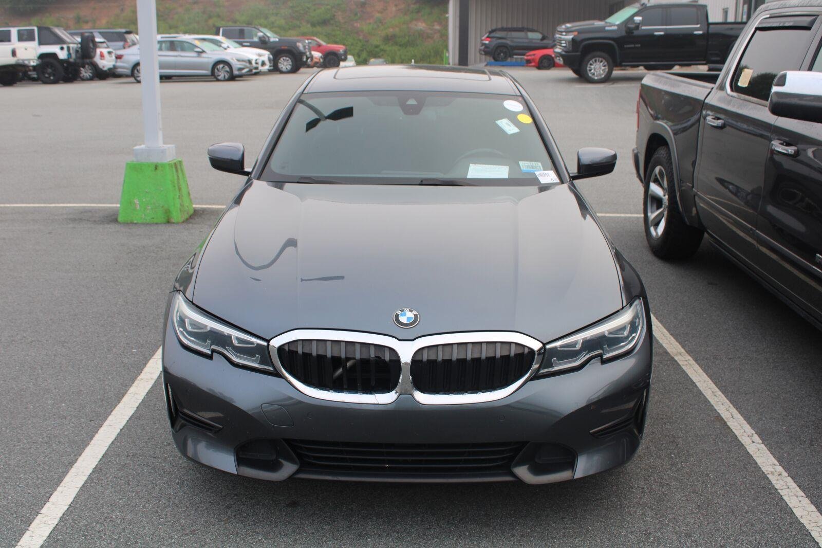 Used 2021 Mineral Gray Metallic BMW 330i xDrive image 2