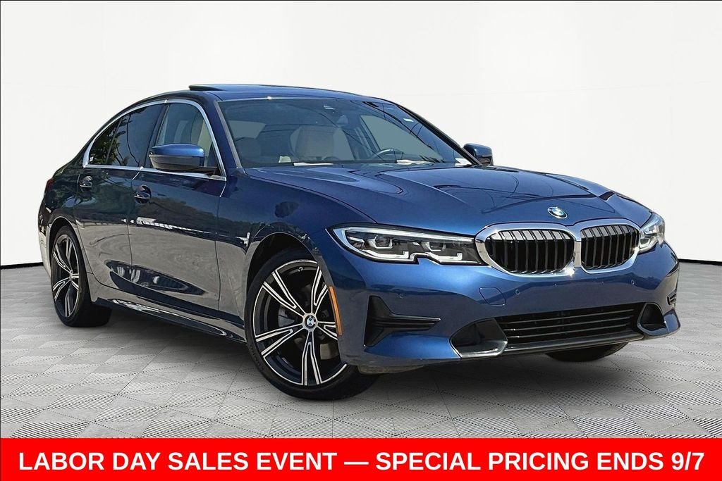 Used 2021 Blue BMW 330i image 1