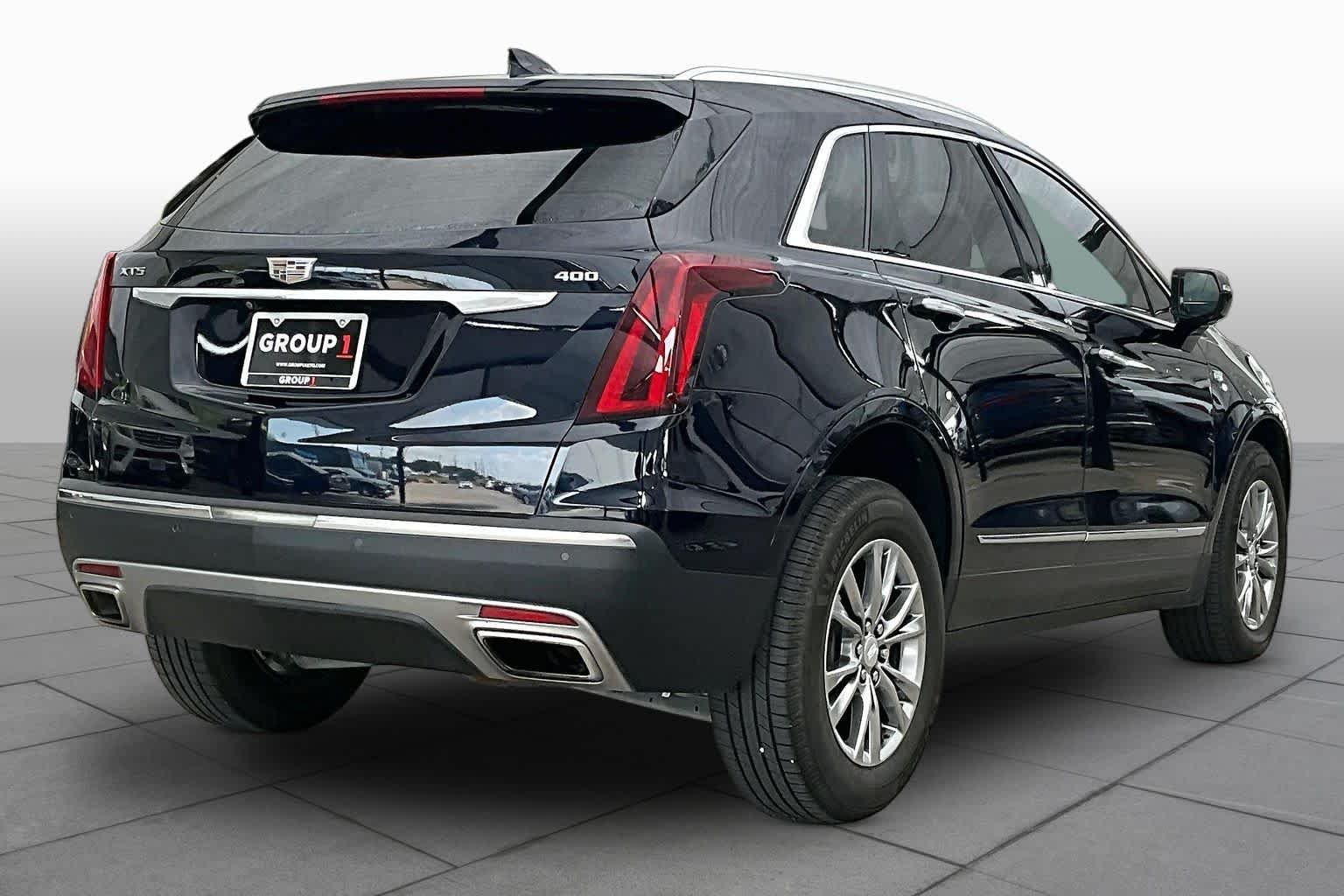 Used 2021 Dark Moon Blue Metallic Cadillac FWD Premium Luxury image 13