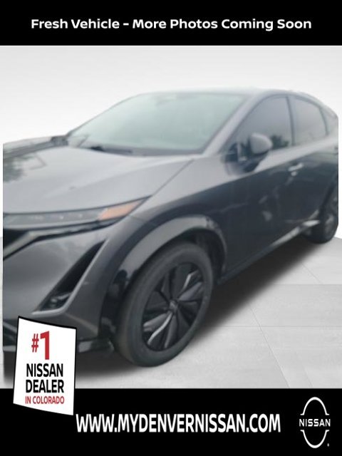 Certified Used 2024 Gray Nissan EVOLVE+ e-4ORCE image 1