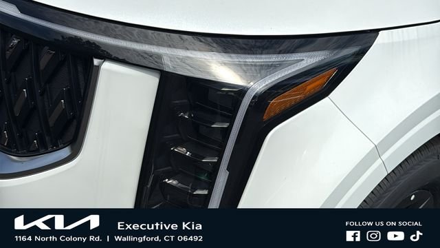 New 2026 Snow White Pearl Kia LX image 7