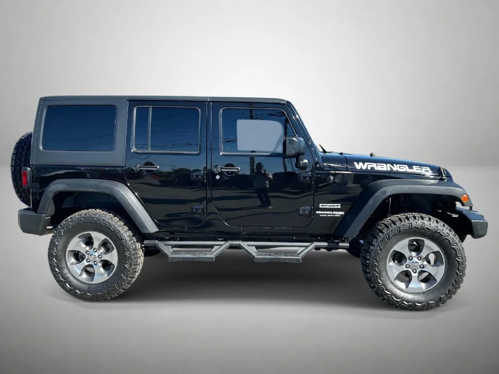 Used 2018 Black Jeep Unlimited Sport image 2