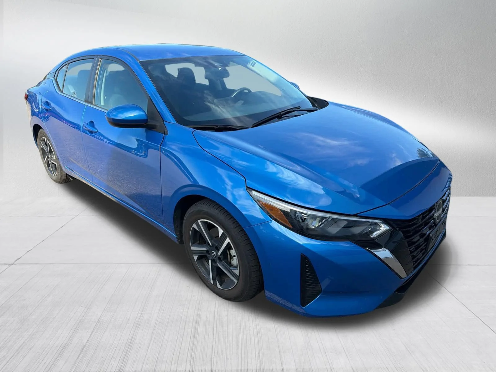 Used 2025 Electric Blue Metallic Nissan SV image 4