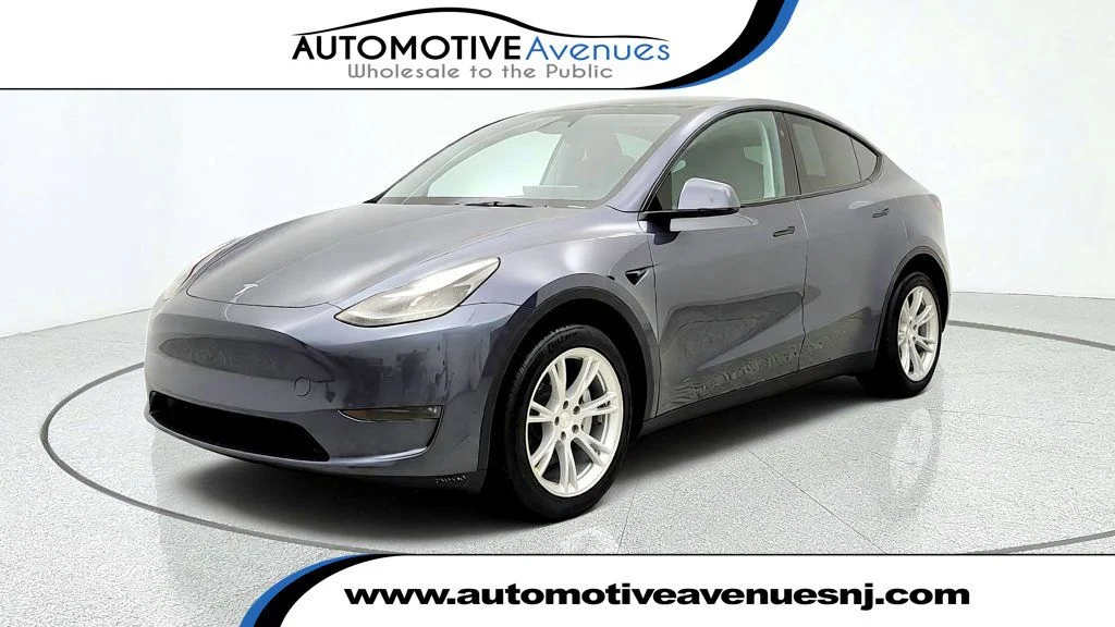 Used 2023 Midnight Silver Metallic Tesla AWD *Ltd Avail* image 1