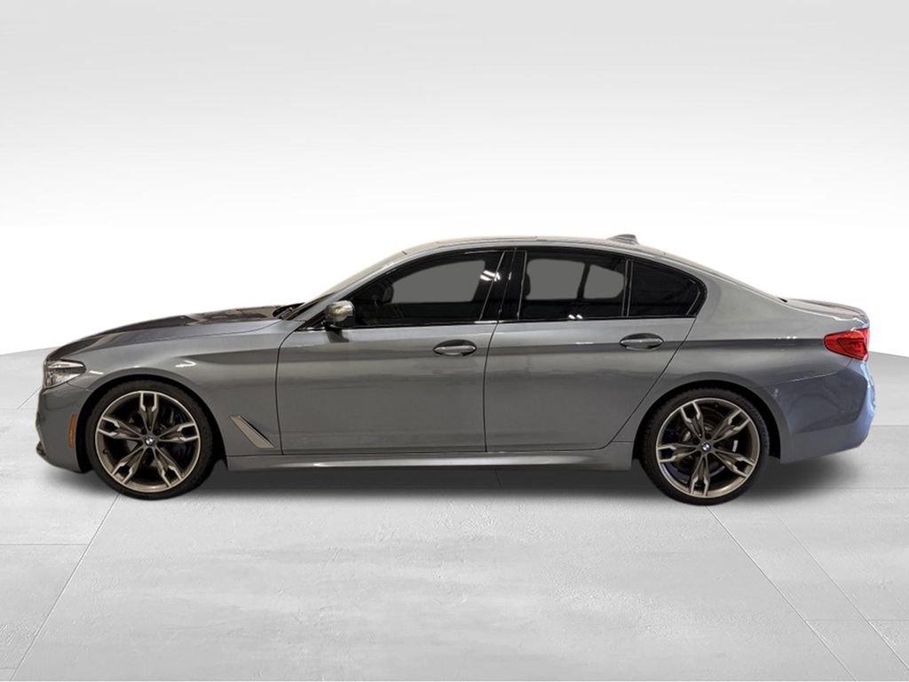 Used 2020 BMW 5 Series M550i with VIN WBAJS7C08LCE05495 for sale in Golden Valley, Minnesota