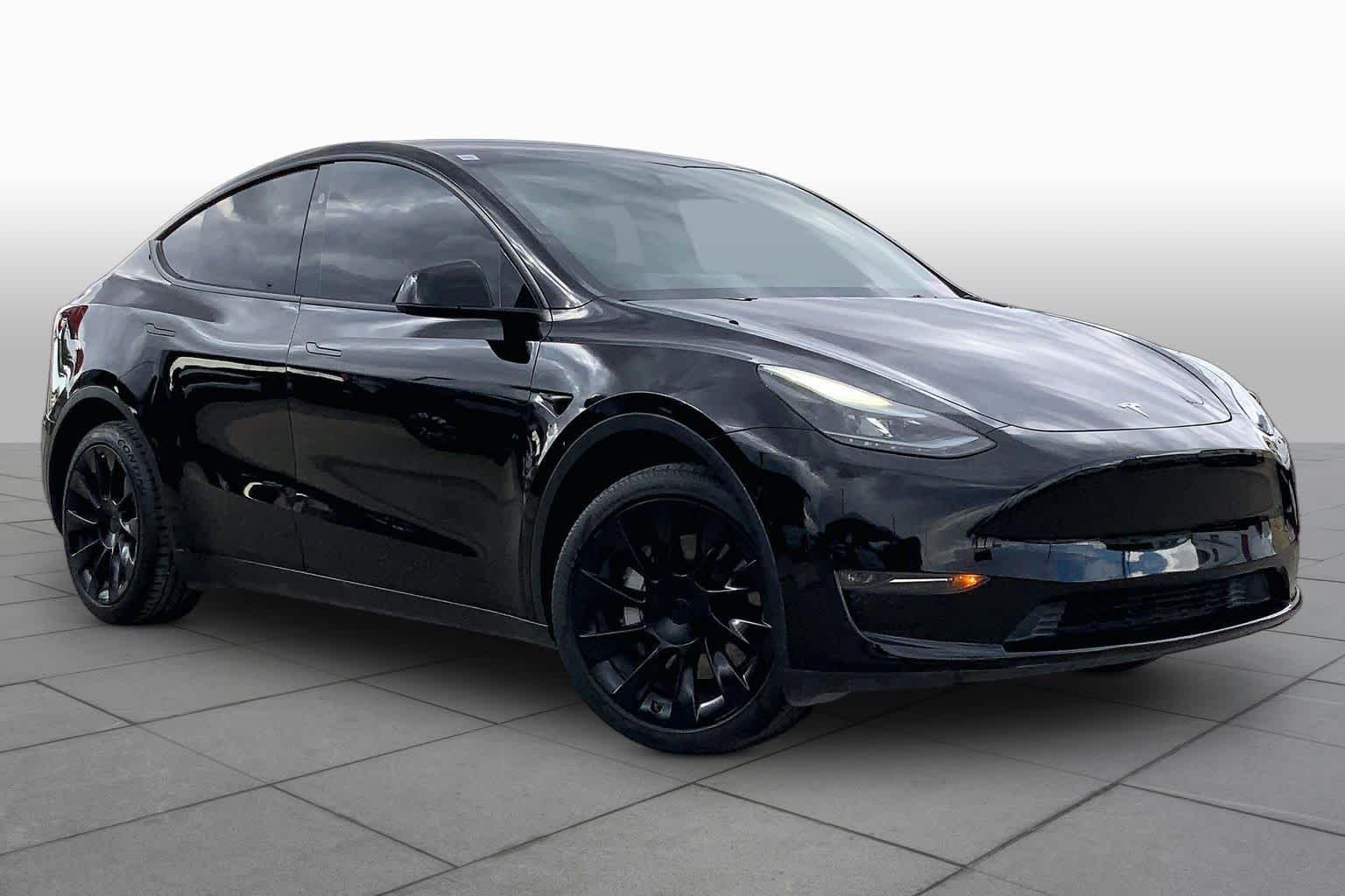 Used 2024 Tesla Model Y Long Range with VIN 7SAYGDEE0RA303658 for sale in Houston, TX