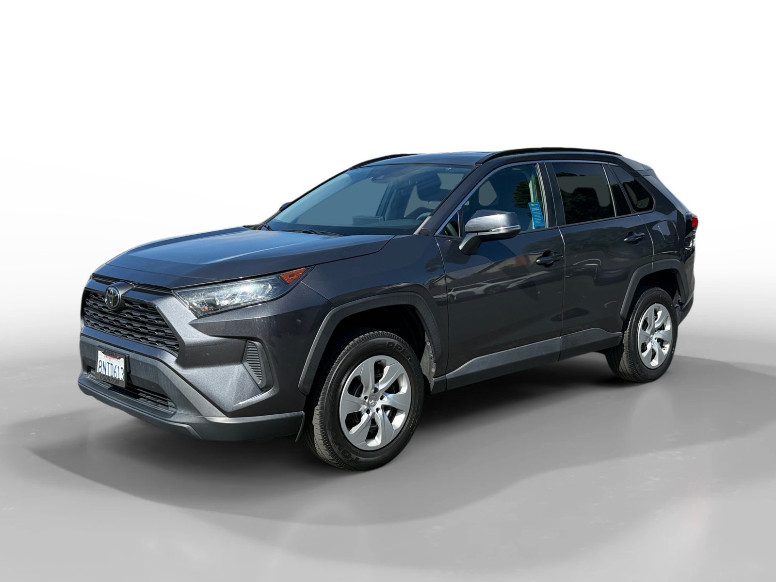 Used 2020 Magnetic Gray Metallic Toyota LE image 1
