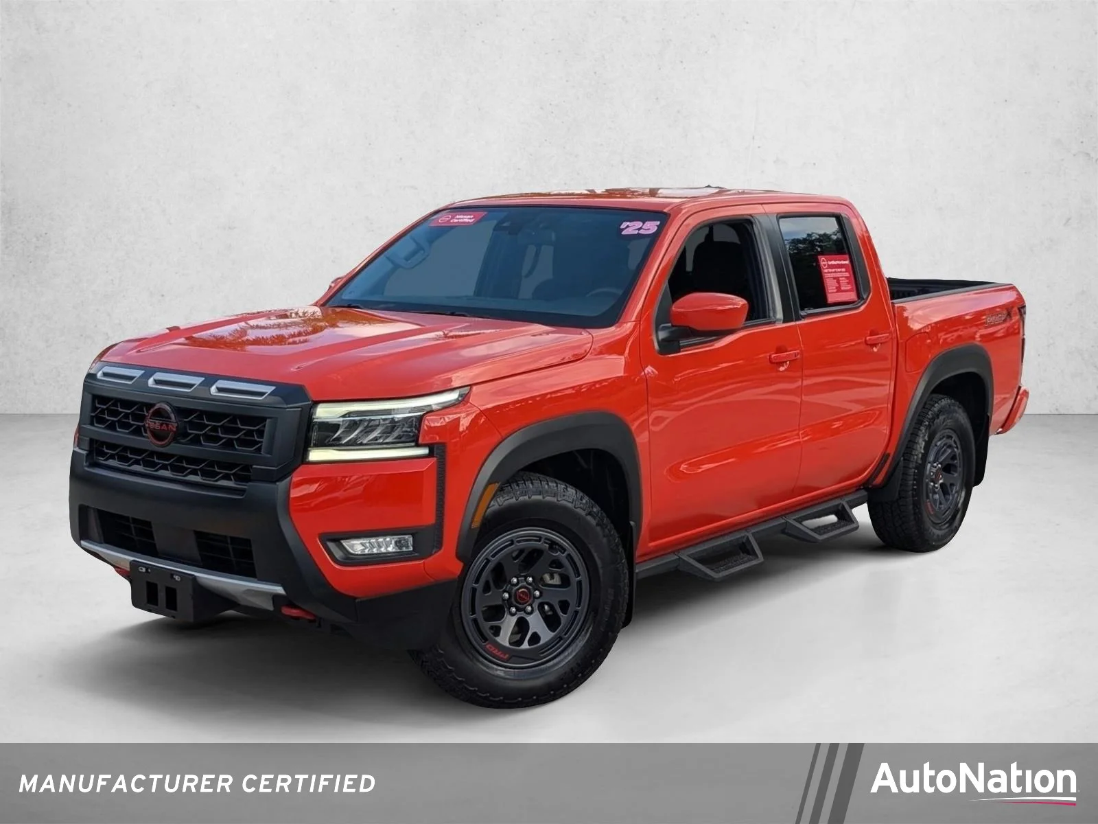 Used 2025 Afterburn Orange Nissan PRO-X image 1