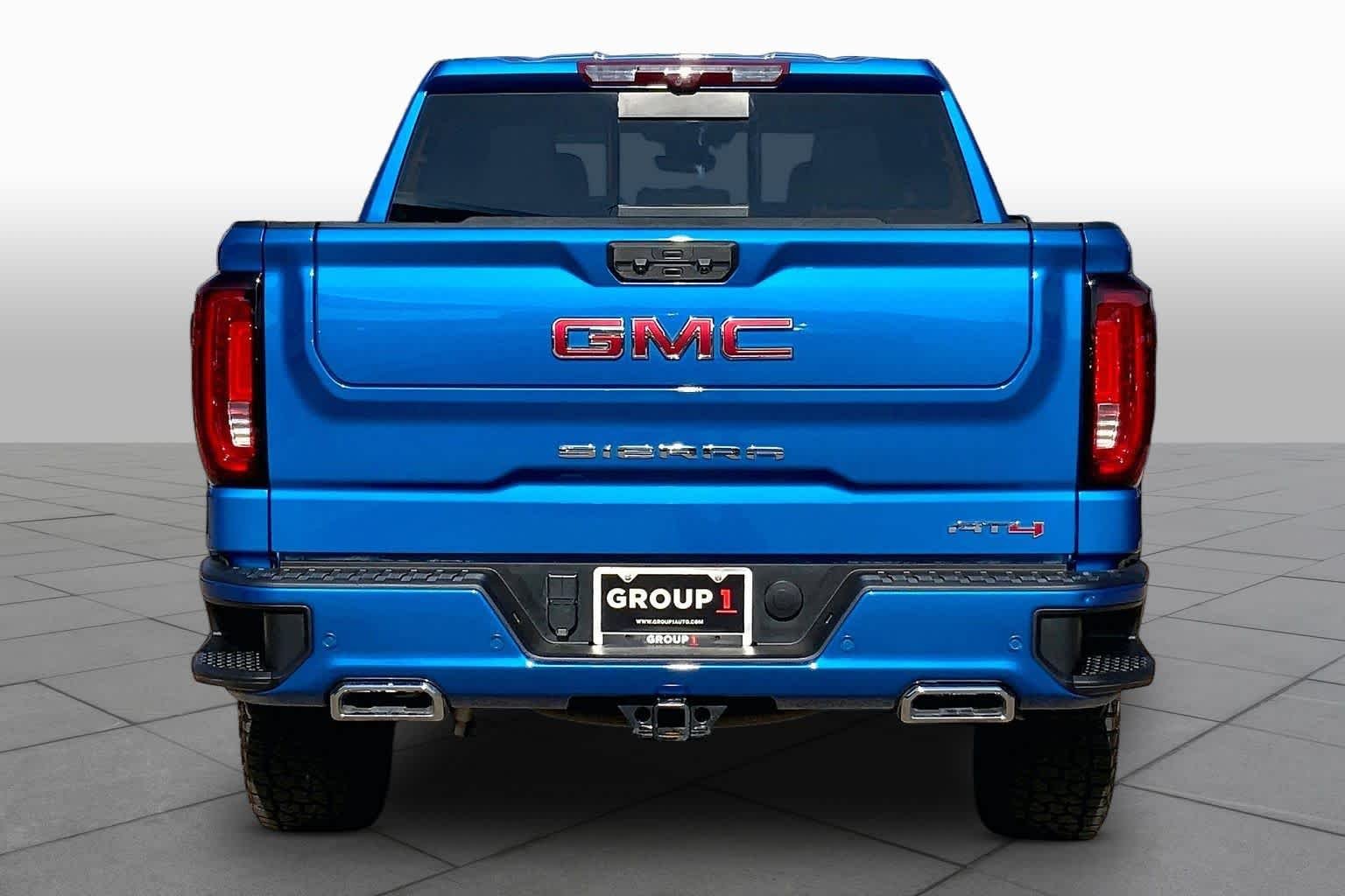 Used 2024 Dynamic Blue Metallic GMC AT4 image 4