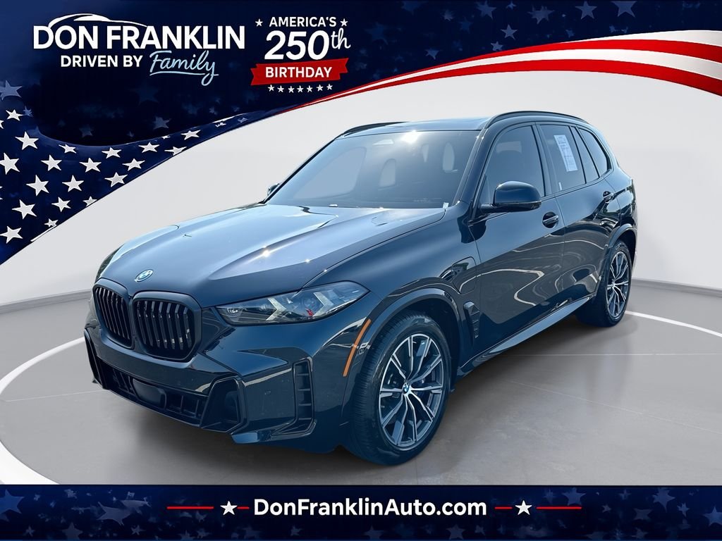 Used 2025 Black BMW xDrive50e image 1