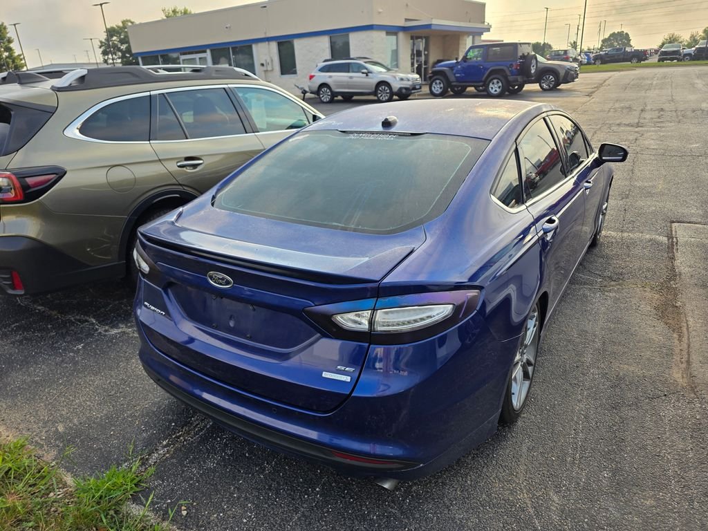 Used 2016 Deep Impact Blue Ford SE image 4