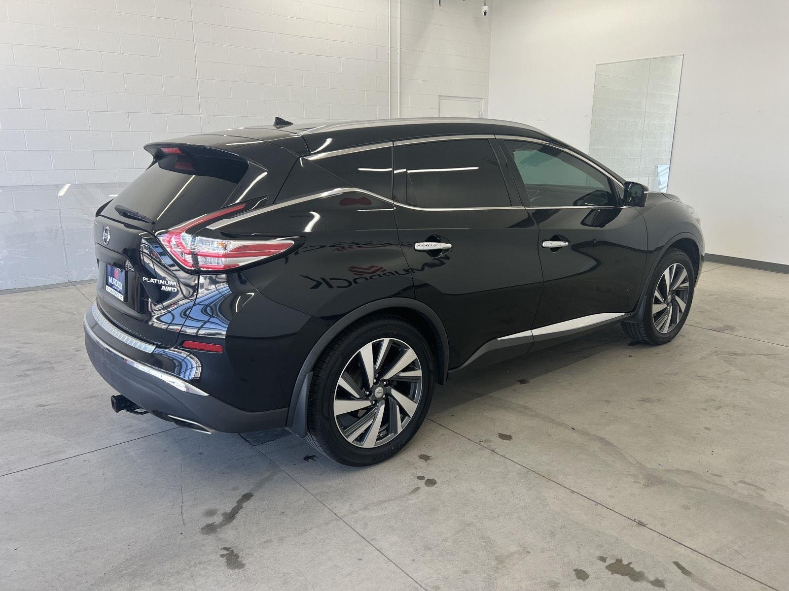 Used 2015 Magnetic Black Metallic Nissan Platinum image 4