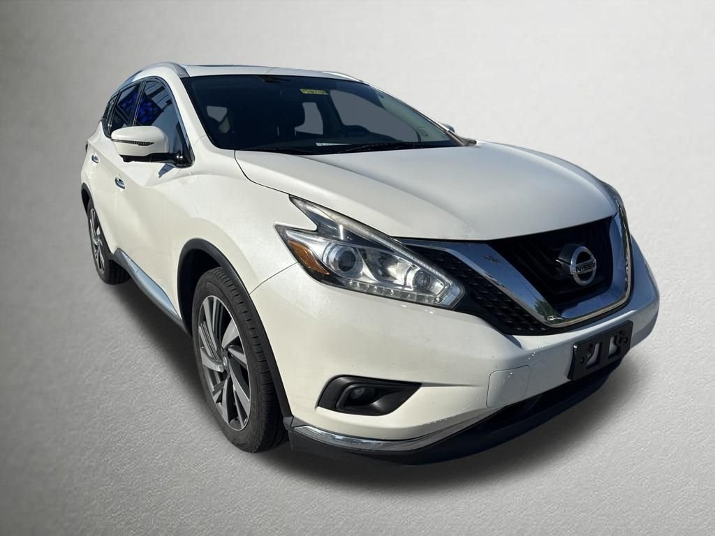 Used 2016 Pearl White Nissan Platinum image 1