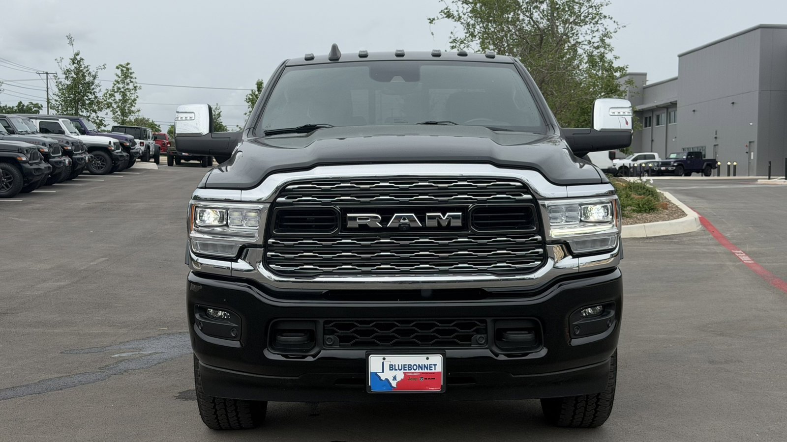 Certified Used 2024 Diamond Black Crystal Pearlcoat Ram Limited image 2