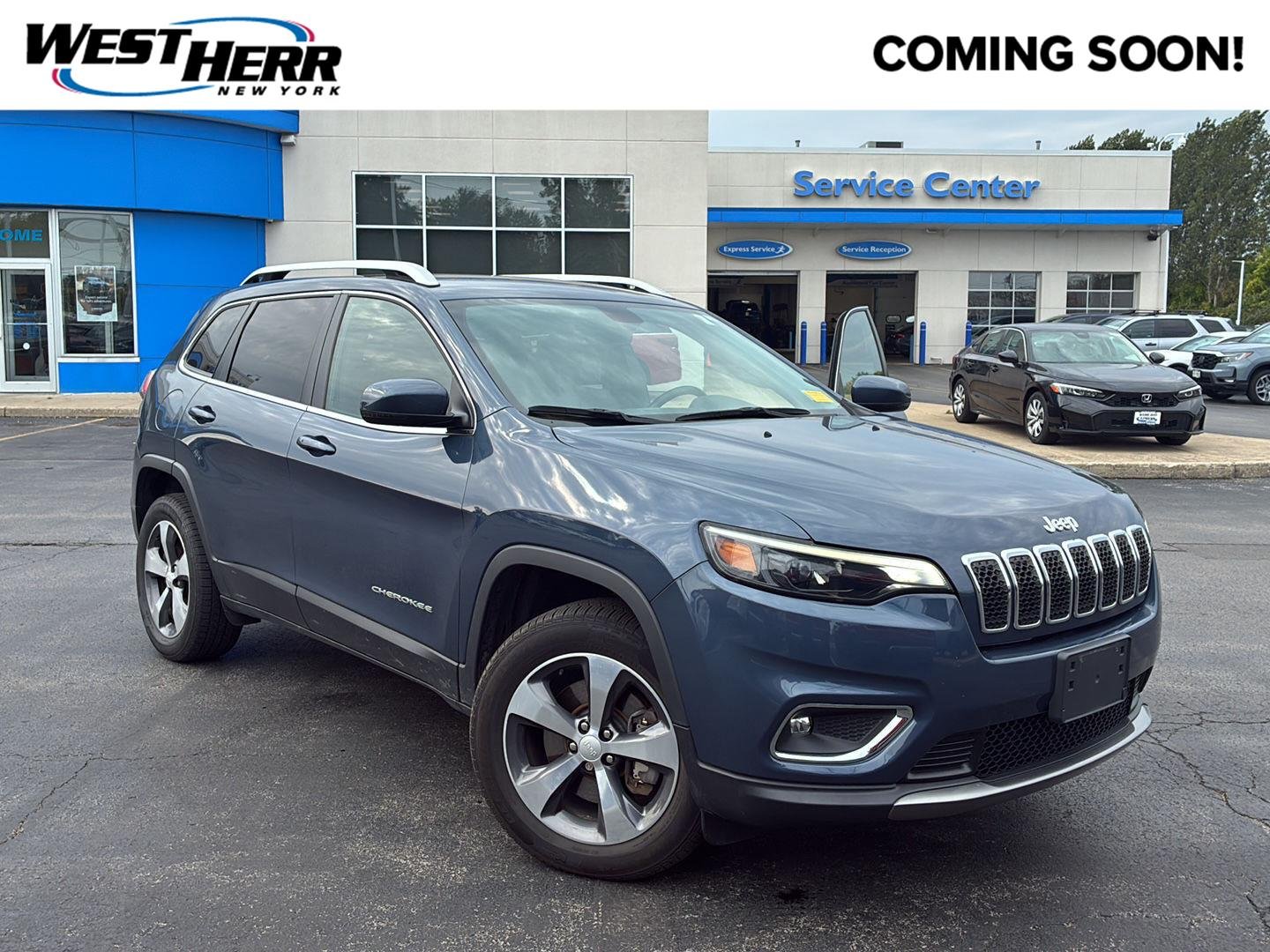 Used 2019 Blue Shade Pearlcoat Jeep Limited image 1