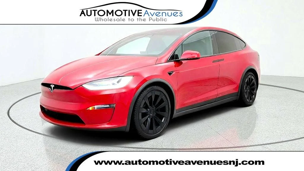 Used 2023 Red Multi-Coat Tesla AWD image 1