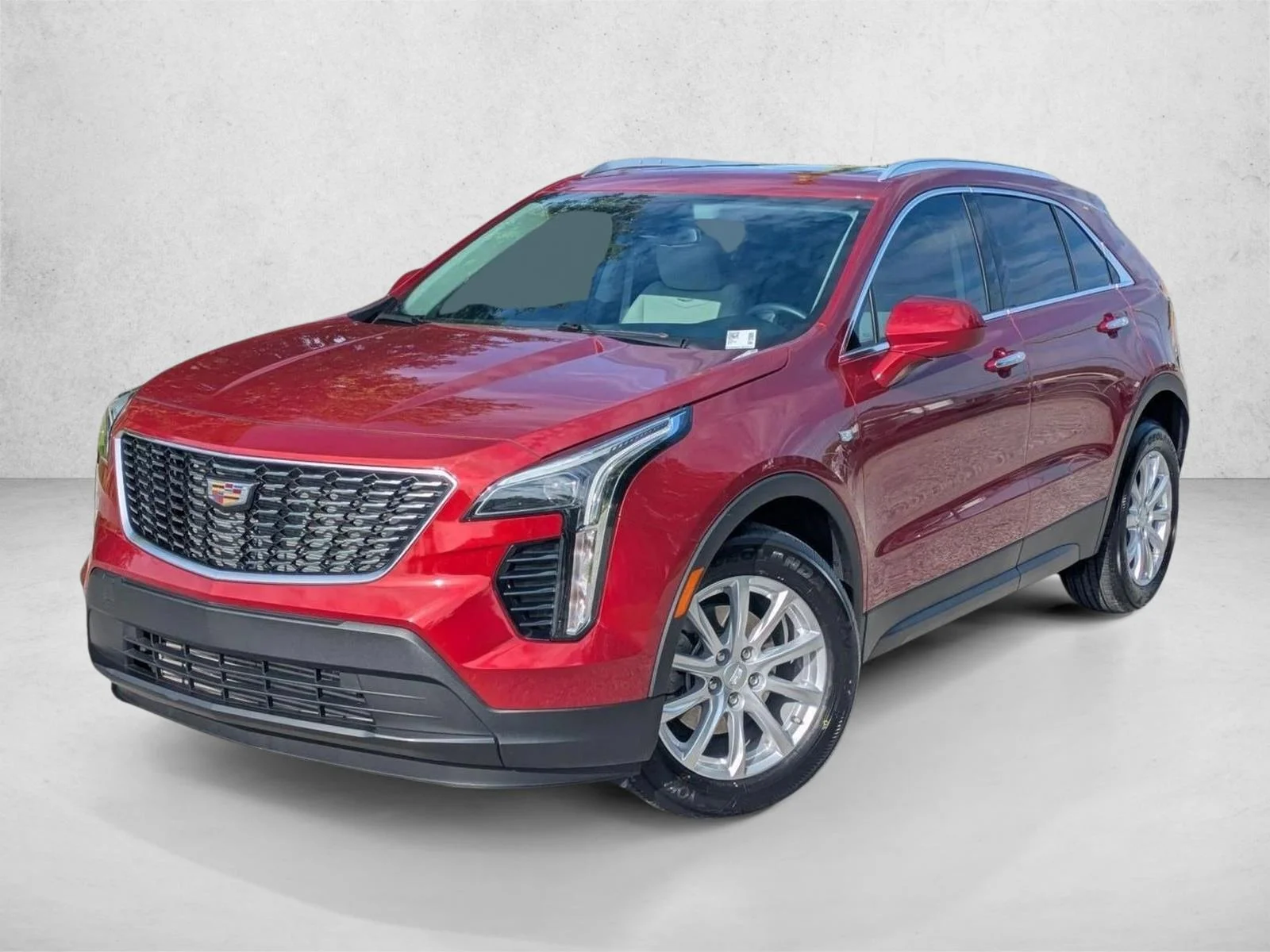 Used 2022 Infrared Tintcoat Cadillac FWD Luxury image 1
