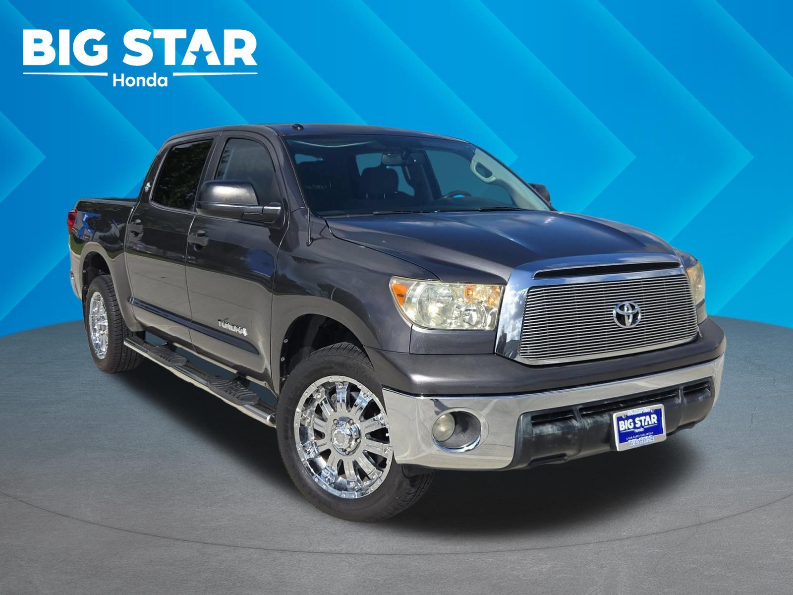 Used 2012 Magnetic Gray Metallic Toyota Grade image 1