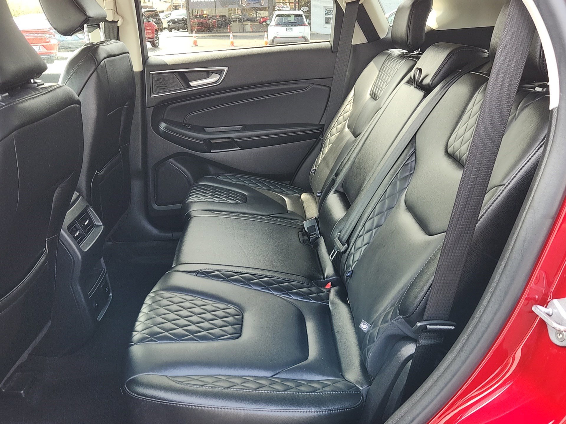 Used 2024 Rapid Red Metallic Tinted Clearcoat Ford Titanium image 24