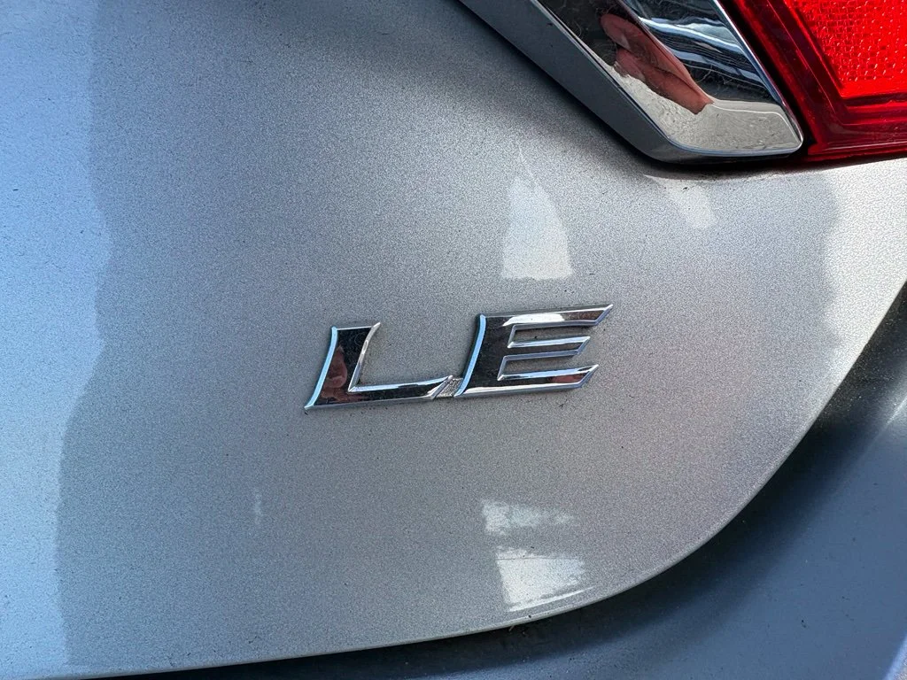 Used 2015 Celestial Silver Metallic Toyota LE image 8