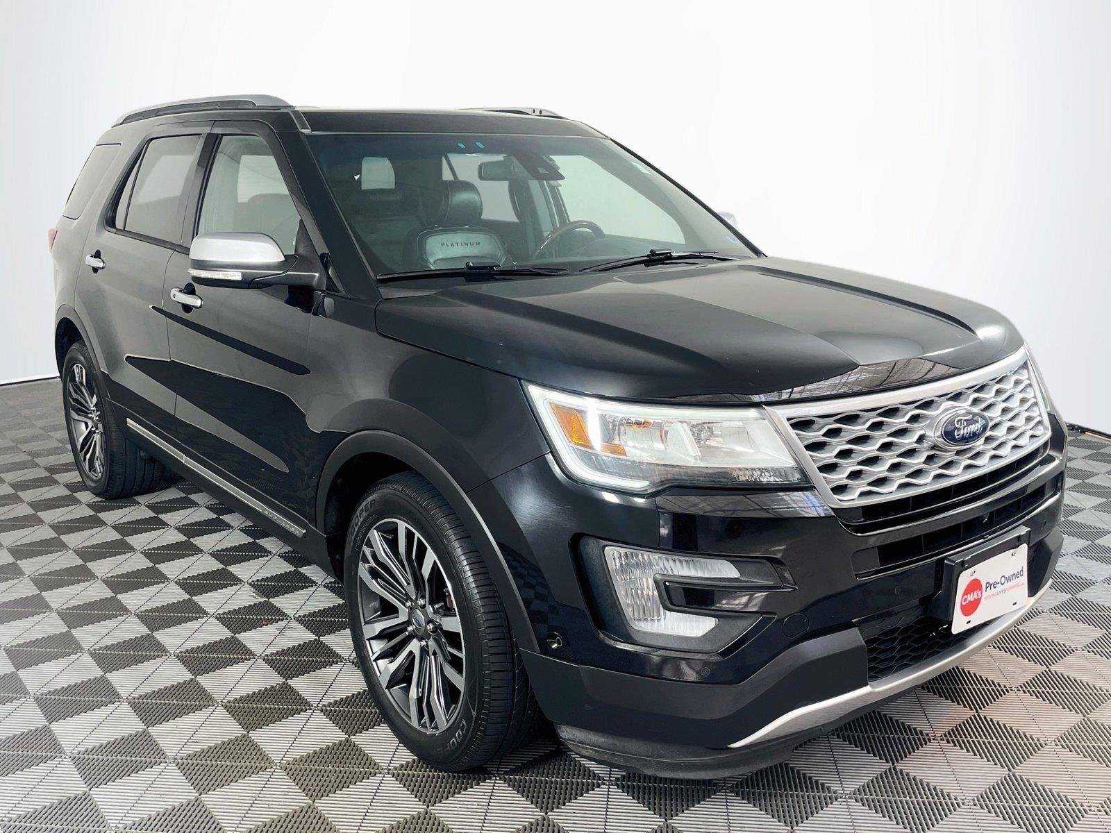 Used 2016 Black Ford Platinum image 1