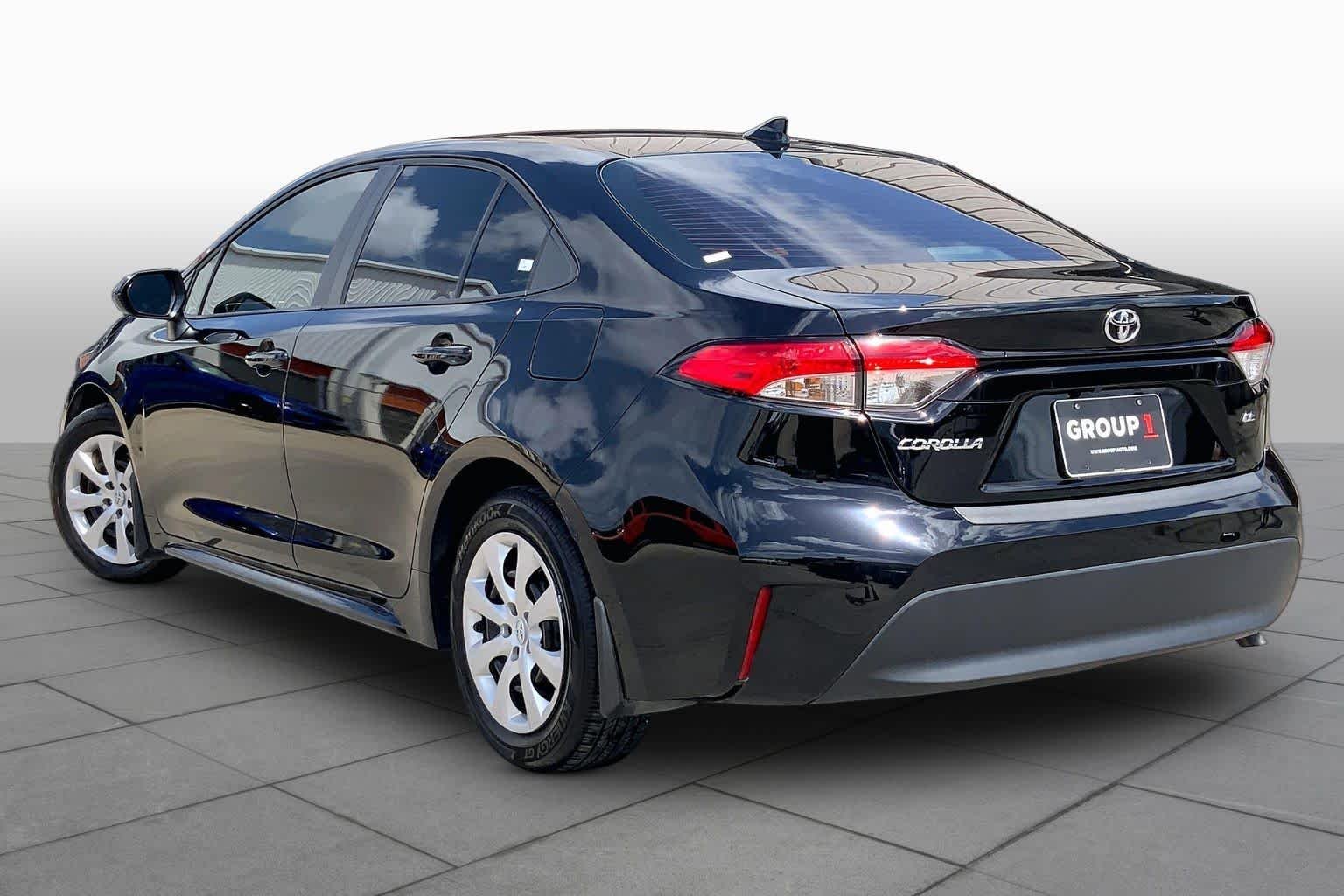 Used 2025 Midnight Black Metallic Toyota LE image 12