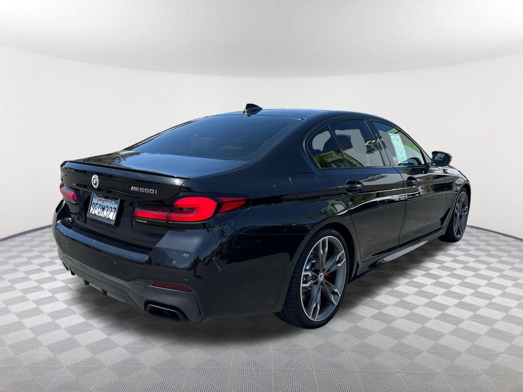 Used 2023 Black BMW M550i xDrive image 4