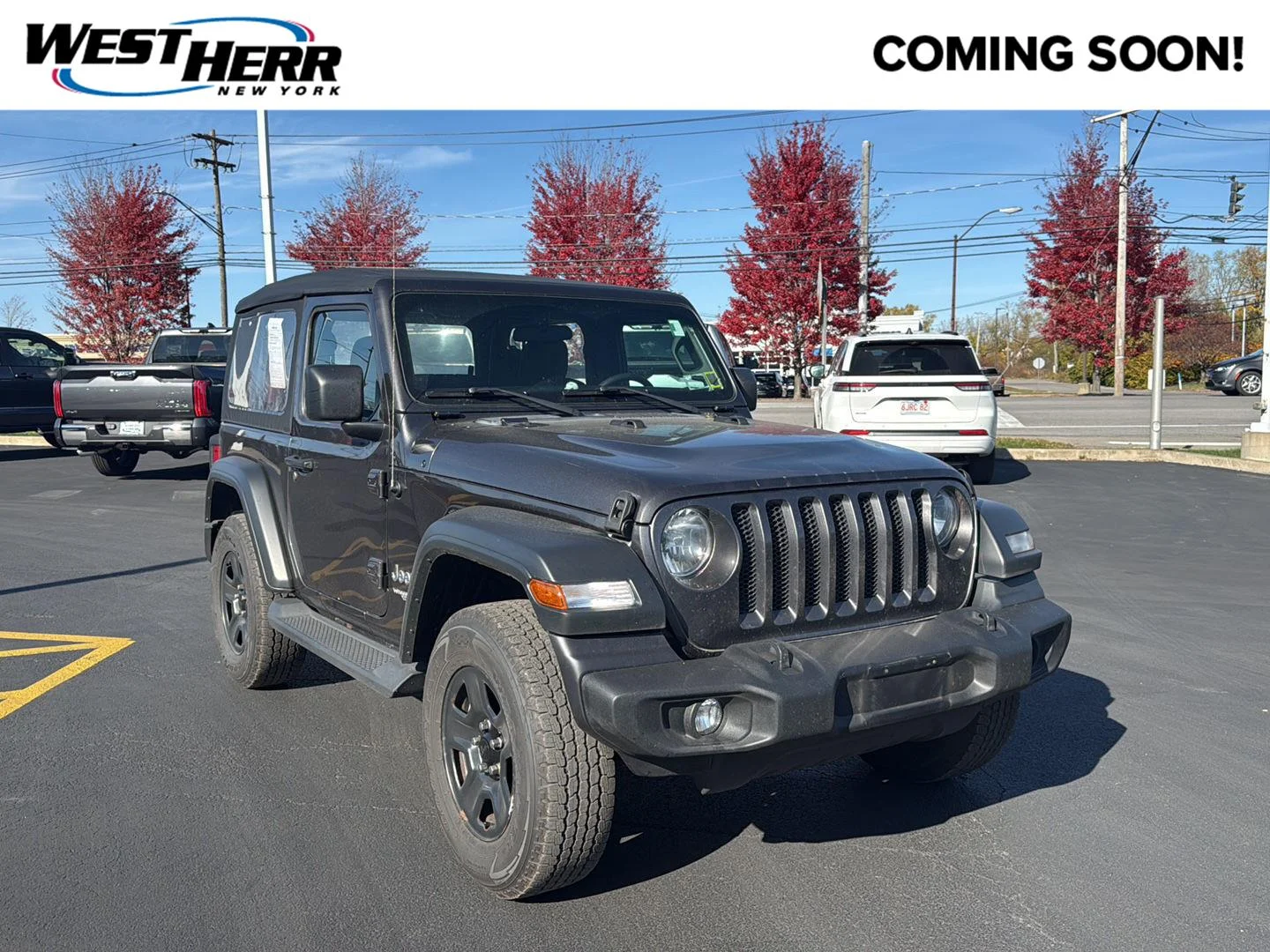 Used 2018 Granite Crystal Metallic Clearcoat Jeep Sport image 1