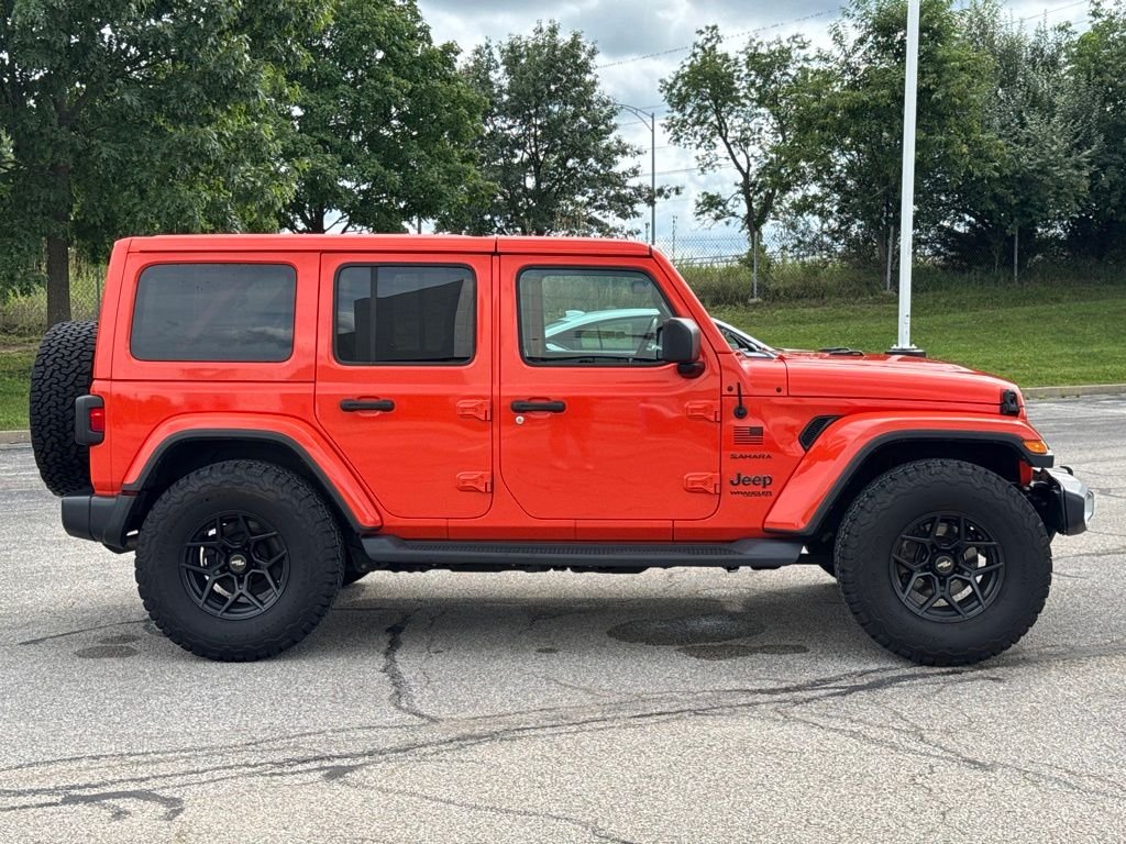 Used 2019 Orange Jeep Unlimited Sahara image 8